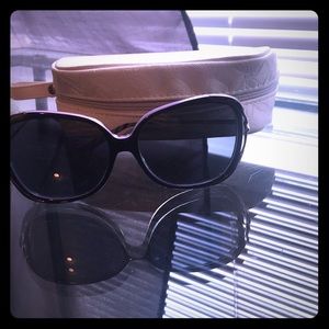 Oakley sunglasses and case.